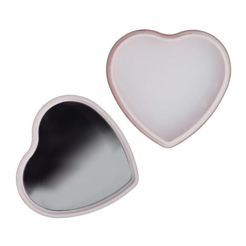 Lippenbalsam in Flacher metallischer Herzformdose