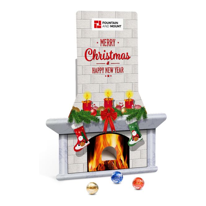 Firmengeschenk Lindt Lindor Adventsspender Kamin – weihnachtszeit – mit bedrucktem Etikett als Weihnachtsgeschenk für Kunden und Partner