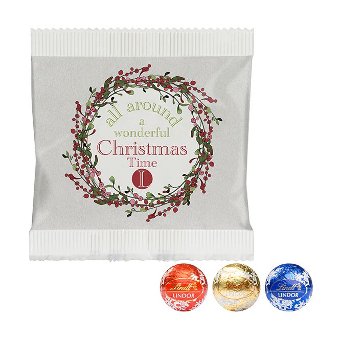 Firmengeschenk Lindt Lindor Pralinés – bunt gemischt – mit individuellem Etikett 3er Pack als Werbemittel für Kunden und Geschäftspartner