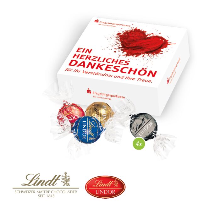 Firmengeschenk Lindt Lindor-Präsent 4er – bunt – mit bedrucktem Etikett als hochwertiges Weihnachtsgeschenk für Kunden und Partner