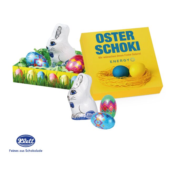 Oster-Werbeartikel Klett Schokolade – osternest – mit bedrucktem Etikett ca. 50g als süßes Oster-Werbegeschenk für Kunden und Mitarbeiter